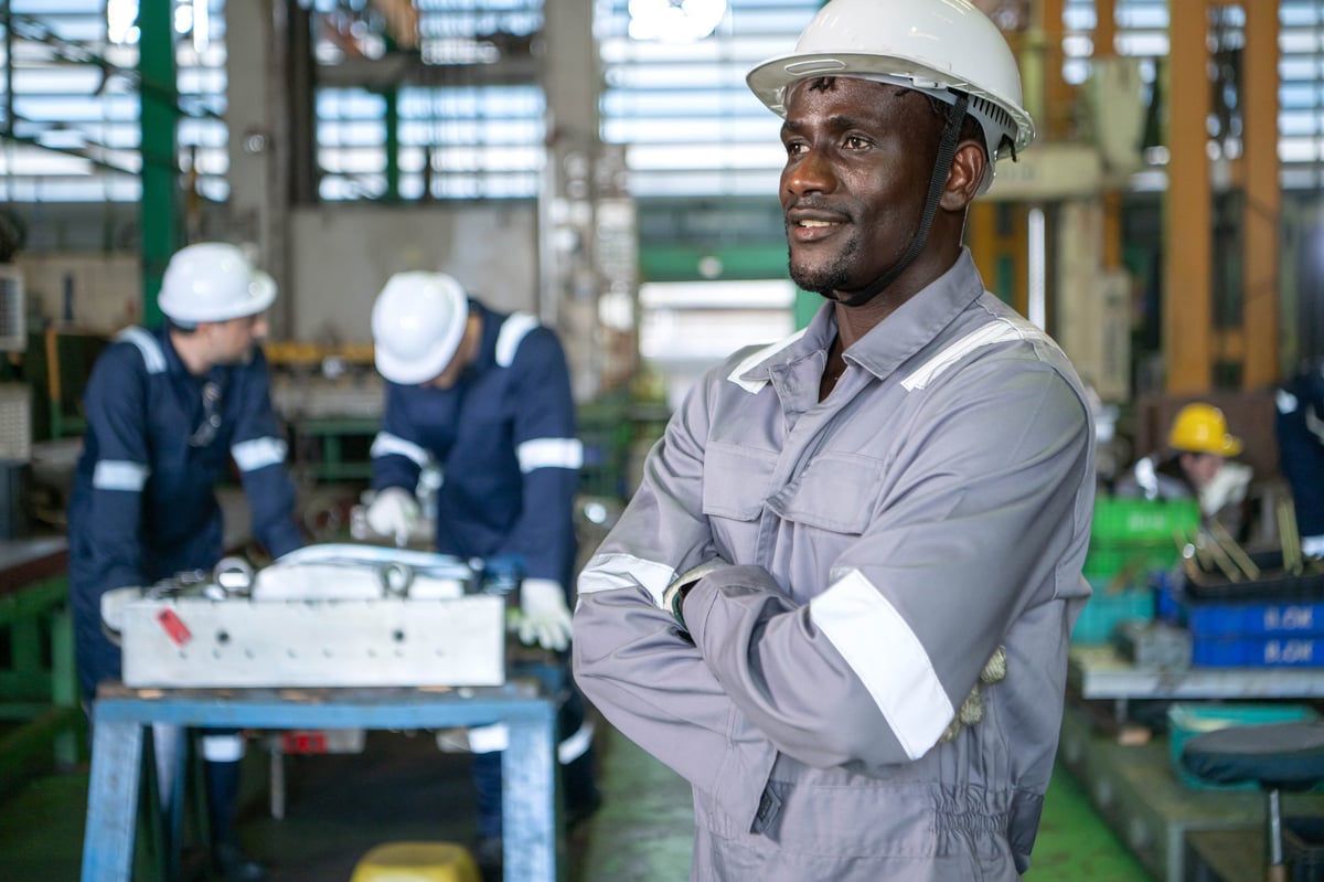 SpillGuard team leader in a hard hat on an industrial site